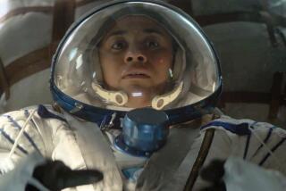 The image released by Bleecker Street shows Ariana DeBose in a scene from "I.S.S." (Bleecker Street via AP)