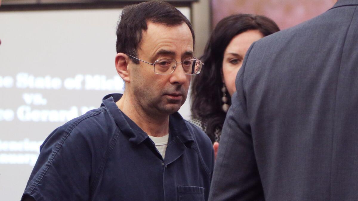 Larry Nassar arrives at court in Lansing, Mich., for the first day of victim impact statements on Jan. 16, 2018.