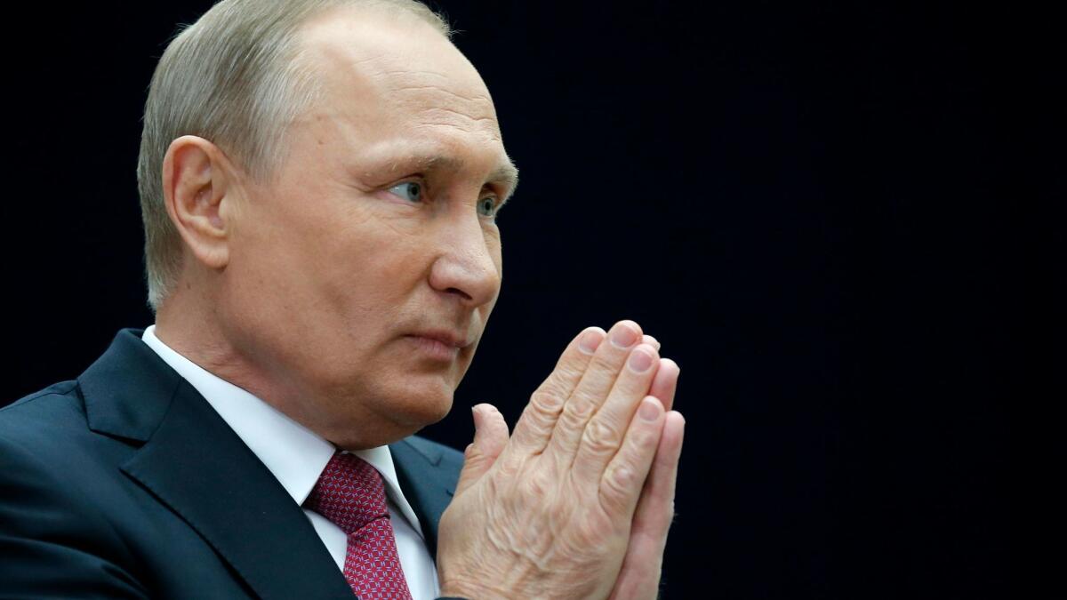 Russian President Vladimir Putin gestures speaking to the media after his annual live call-in show in Moscow, Russia.