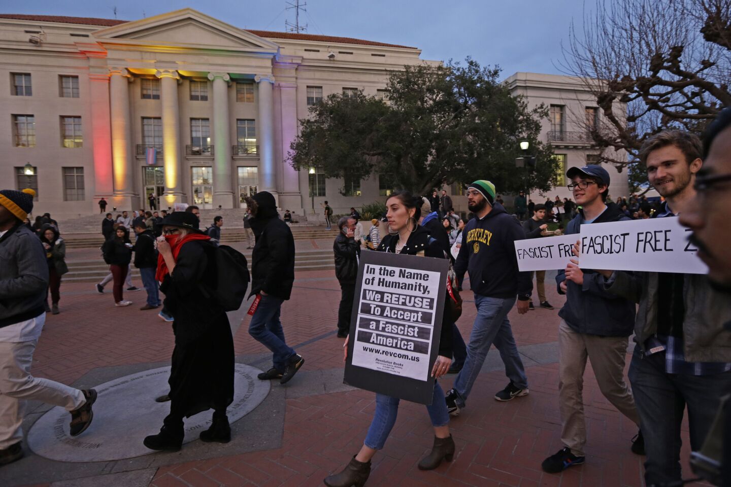 People march in front of Sproul Hall to protest the appearance of Breitbart News editor Milo Yiannop