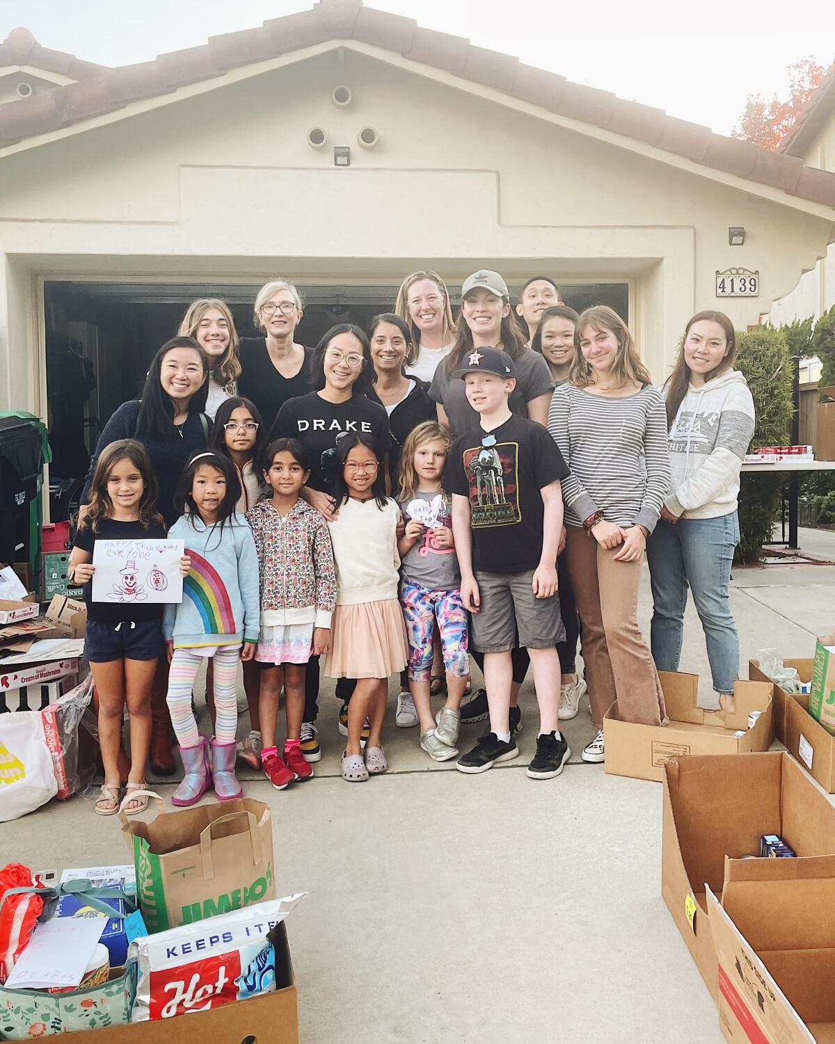 92130 Cares volunteers helped pack up food for Thanksgiving meals.
