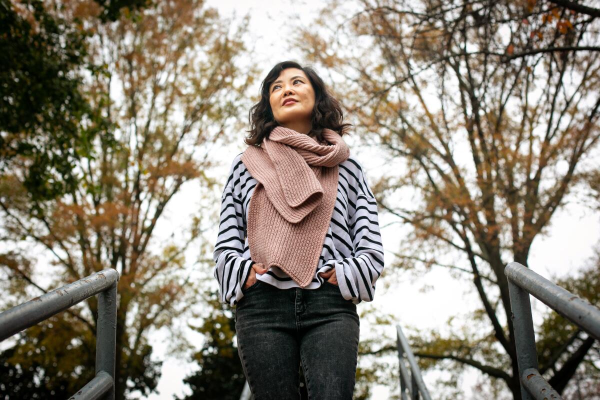 Stephanie Cho poses for a portrait outdoors in Norcross, Ga., on Dec. 4.