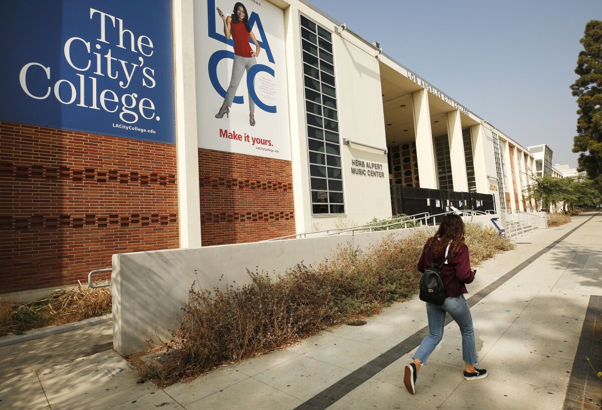 A student walks on the campus of Los Angeles City College.