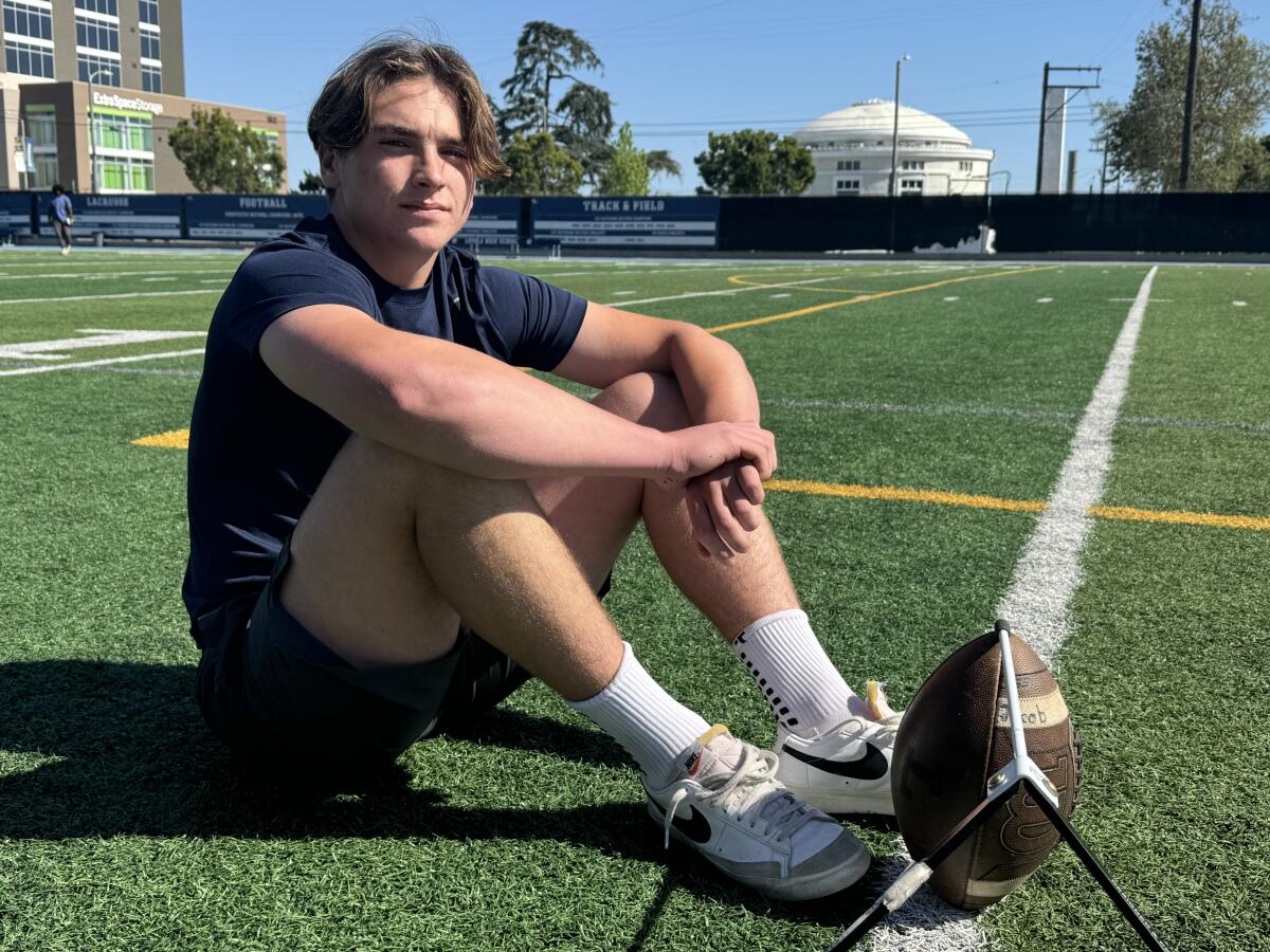 Junior kicker Jacob Kreinbring of Loyola High poses for a photo on the school's football field.