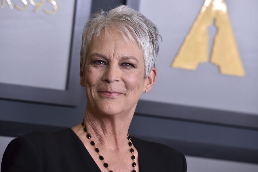 FILE - Jamie Lee Curtis appears at the Governors Awards in Los Angeles on Nov. 19, 2022. Curtis is this year's recipient of AARP The Magazine's Movies for Grownups Awards career achievement honor. The group announced Thursday that Curtis is receiving the honor at the AARP's annual Best Movies and TV for Grownups ceremony. The event is hosted by returning host Alan Cumming and is premiering on PBS on Feb. 17, 2023, at 9 p.m. E.T. (Photo by Jordan Strauss/Invision/AP, File)