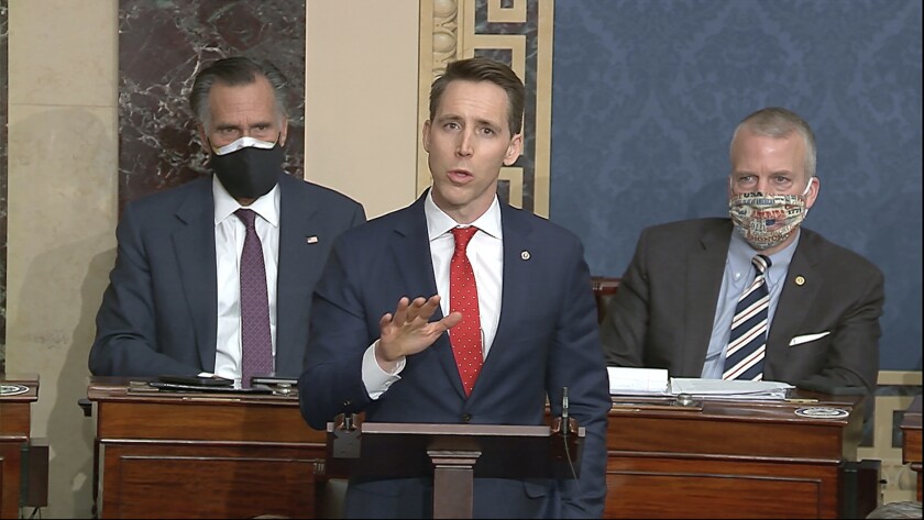 FILE - In this Jan. 6, 2021 file image from video, Sen. Josh Hawley, R-Mo., speaks at the U.S. Capitol in Washington. At least four additional companies that have donated to Hawley have announced they are suspending campaign contributions. The announcements by Cerner Corp. in Kansas City, Ameren Corp. and Edward Jones in St. Louis and the Chicago law firm Bryan Cave Leighton Paisner adds to a growing list of donors who have cut ties to the Missouri Republican senator since the attack on the Capitol last week. (Senate Television via AP File)