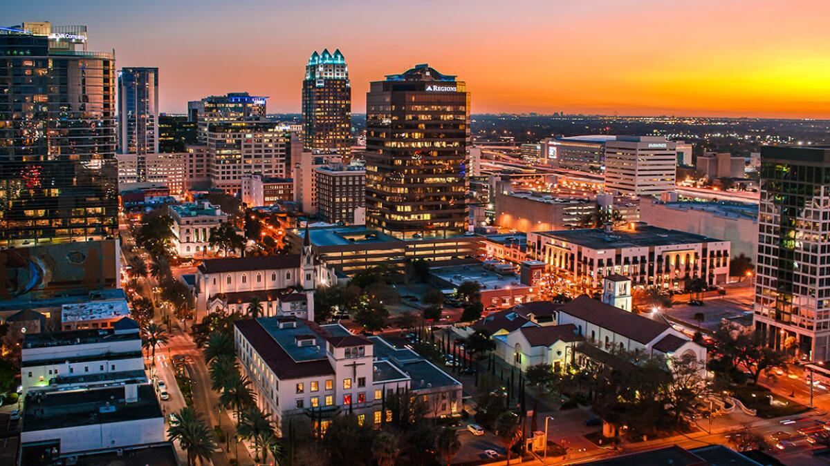 Downtown Orlando, Fla., at sunset. Delta and United are offering a $237 round trip from LAX through Nov. 3.