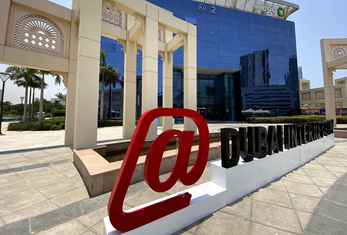 The logo of Dubai Internet City is displayed in front of their offices in Dubai, United Arab Emirates, Thursday, June 9, 2022. The TECOM Group, whose 10 holdings include Dubai Internet City and Dubai Media City, and is a major free zone operator in Dubai owned by the sheikhdom's ruler said Thursday it would make an initial public offering on the local stock market, the latest state asset to list in an effort to boost the city-state's bourse. (AP Photo/Kamran Jebreili)