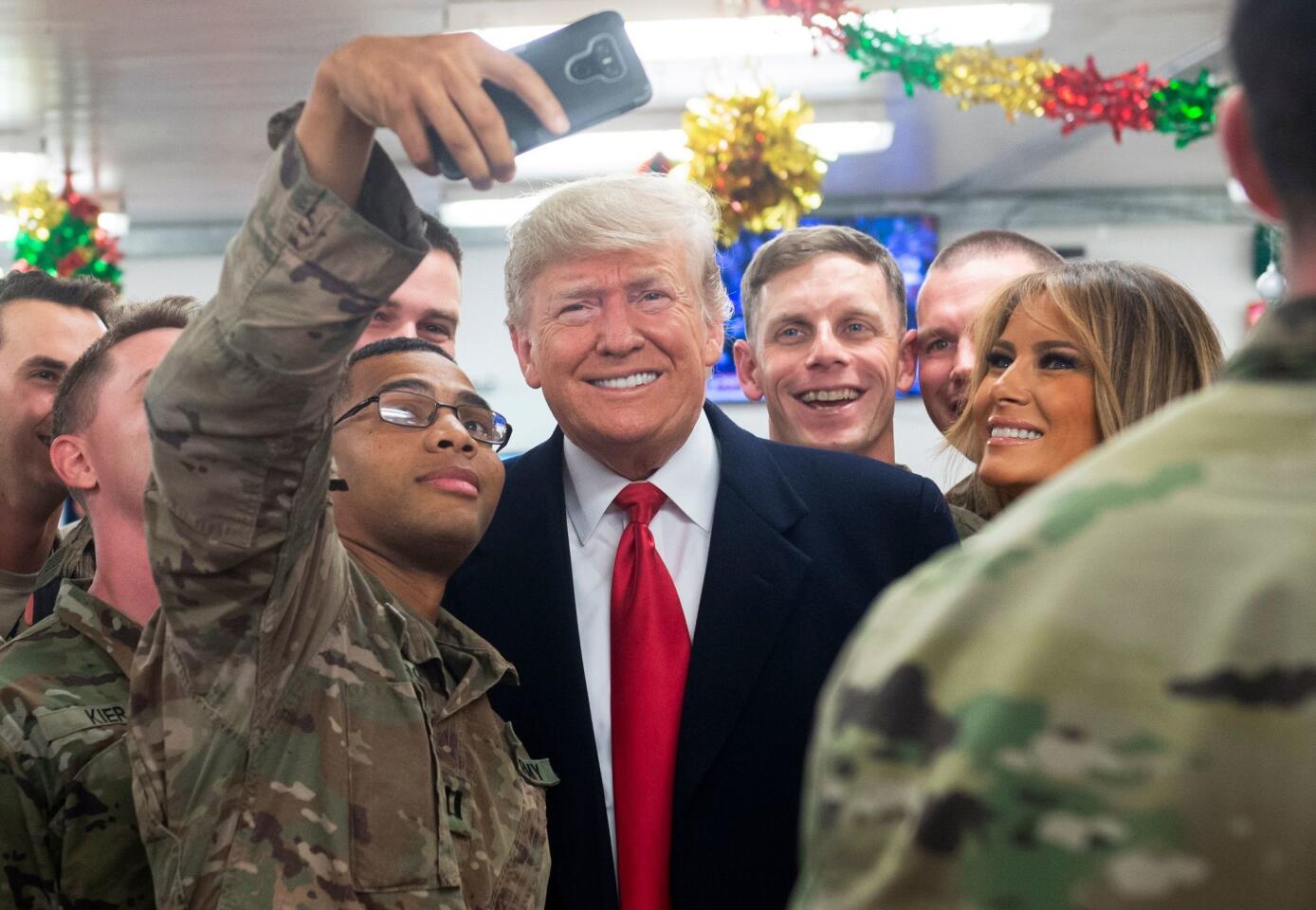 President Trump and First Lady Melania Trump greet members of the U.S. military in Iraq.