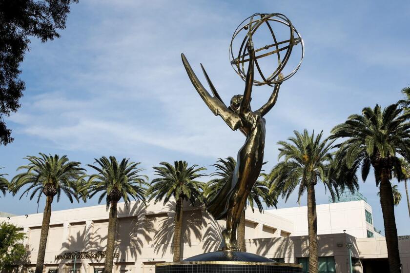 NORTH HOLLYWOOD, CA--MARCH 6, 2014--A giant Emmy statue sits atop a fountain in front of the Academy of Television Arts & Sciences' North Hollywood headquarters, March 6, 2014. (Jay L. Clendenin / Los Angeles Times)