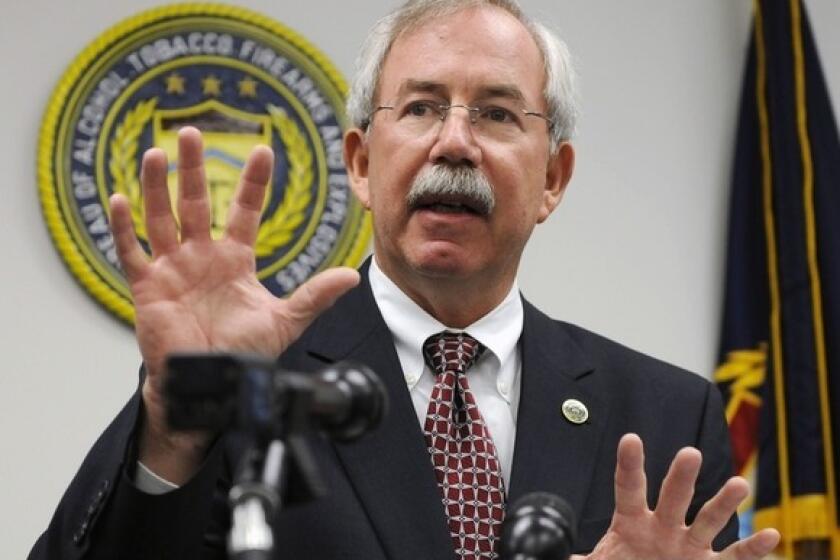 Bureau of Alcohol, Tobacco, Firearms and Explosives' acting director Kenneth Melson speaks at a Houston news conference in April 2009.