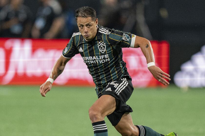 LA Galaxy forward Javier Hernandez (14) plays against the Charlotte FC.