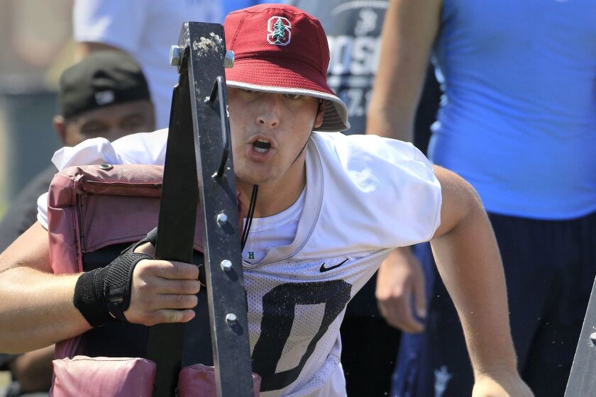 MISSION VIEJO, CA., JULY 13, 2019: St. John Bosco guard Drake Metcalf drives his portion of the two-man sled during lineman competition at the Mission Viejo passing tournament at Mission Viejo High school July 13, 2019 (Mark Boster For the LA Times).