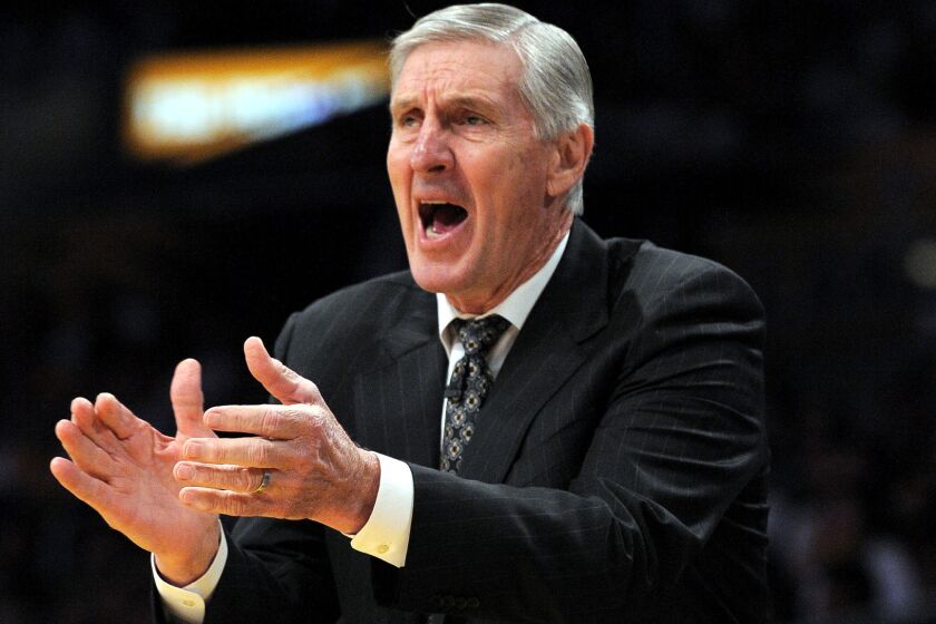 Jerry Sloan yells instructions to the Jazz during a playoff game against the Lakers.