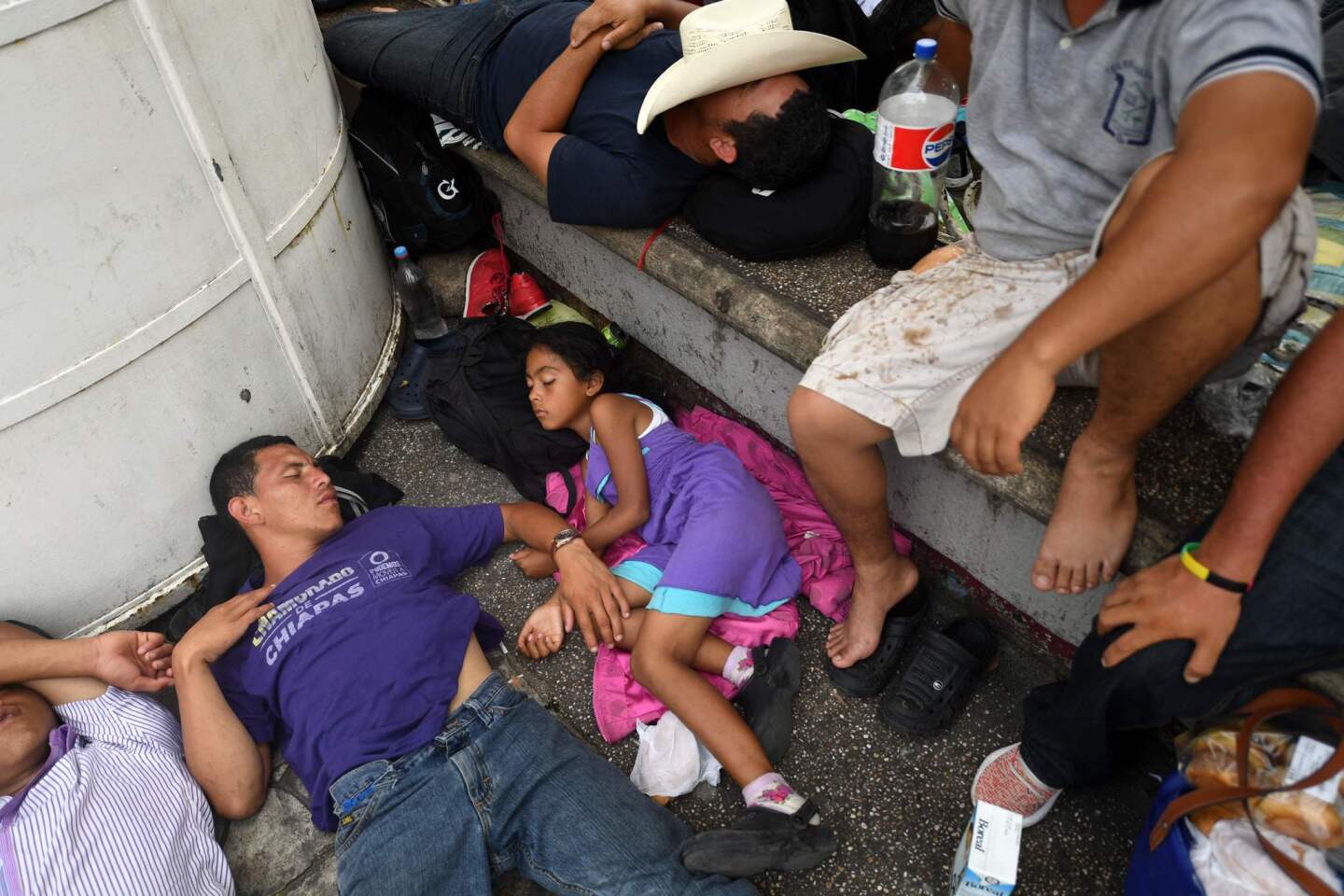 Honduran migrants taking part in a caravan heading to the U.S. rest at the main square in Tapachula, Chiapas state, Mexico.