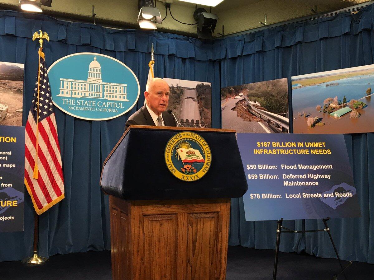 Gov. Jerry Brown unveils flood and water proposals at the state Capitol.