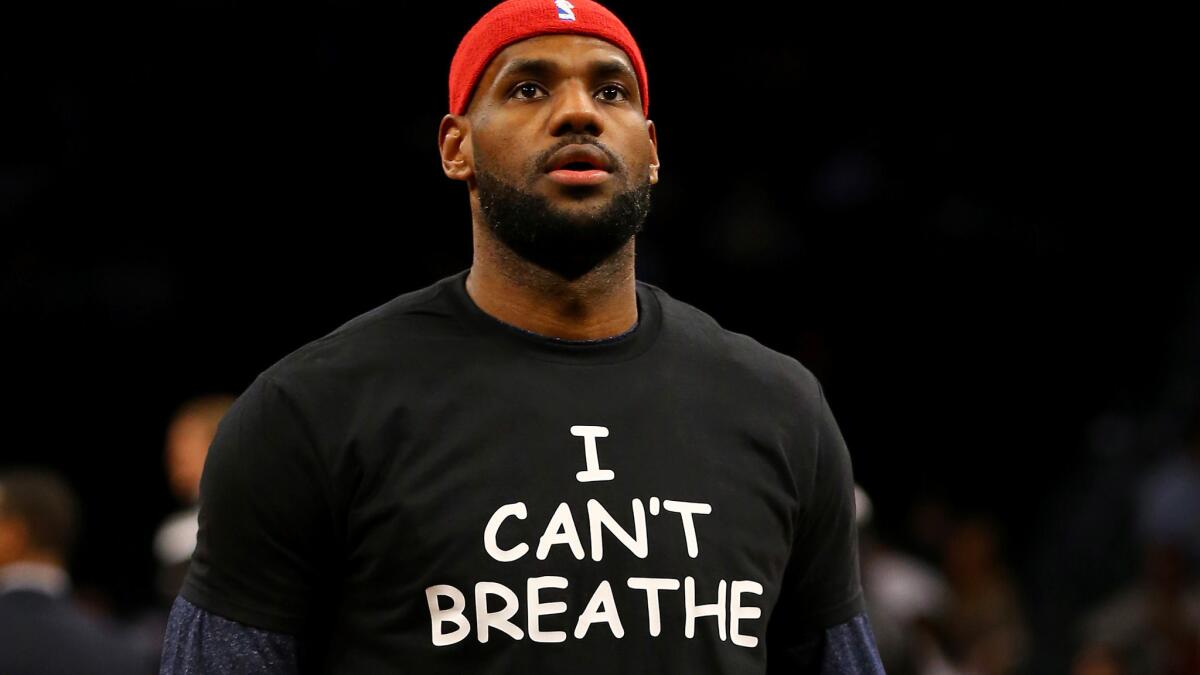 Cavaliers All-Star forward LeBron James wears an "I Can't Breathe" shirt during warmups before a game a Dec. 8, 2014, in the aftermath of Eric Garner's death.