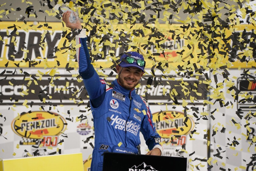 Kyle Larson celebrates after winning a NASCAR Cup Series auto race Sunday, March 7, 2021, in Las Vegas. (AP Photo/John Locher)