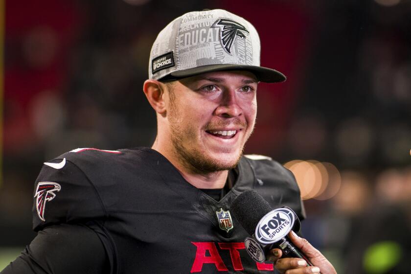 Atlanta Falcons quarterback Taylor Heinicke speaks during a media conference.