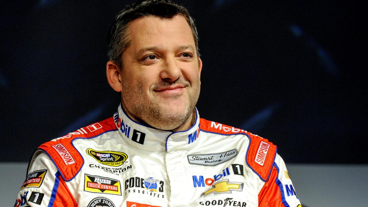 NASCAR driver Tony Stewart talks to reporters during a media tour on Jan. 21 at Charlotte Motor Speedway.