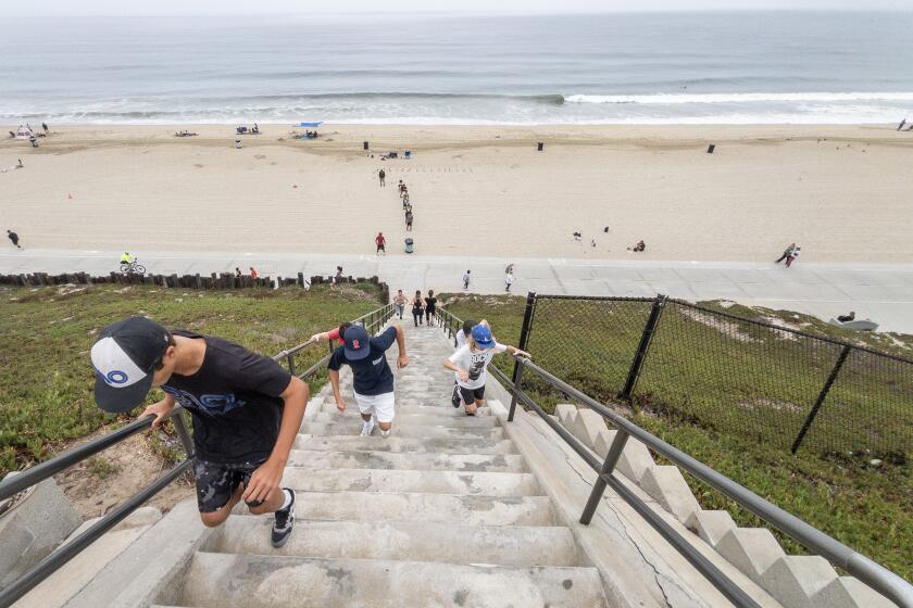 REDONDO BEACH, CA - JULY 06: The Avenue C Stairs in Redondo Beach is one of a series of stairs and ramps connecting the Esplanade and the beach. Photographed in Redondo Beach, CA on Saturday, July 6, 2024. (Myung J. Chun / Los Angeles Times)