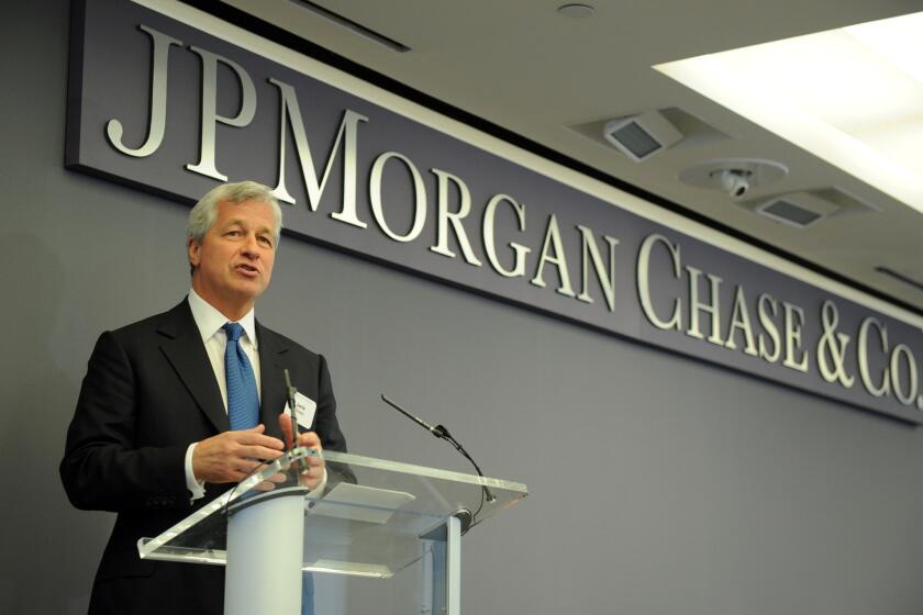 JPMorgan Chase chief Jamie Dimon is to undergo treatment for throat cancer. Above, Dimon on June 23.