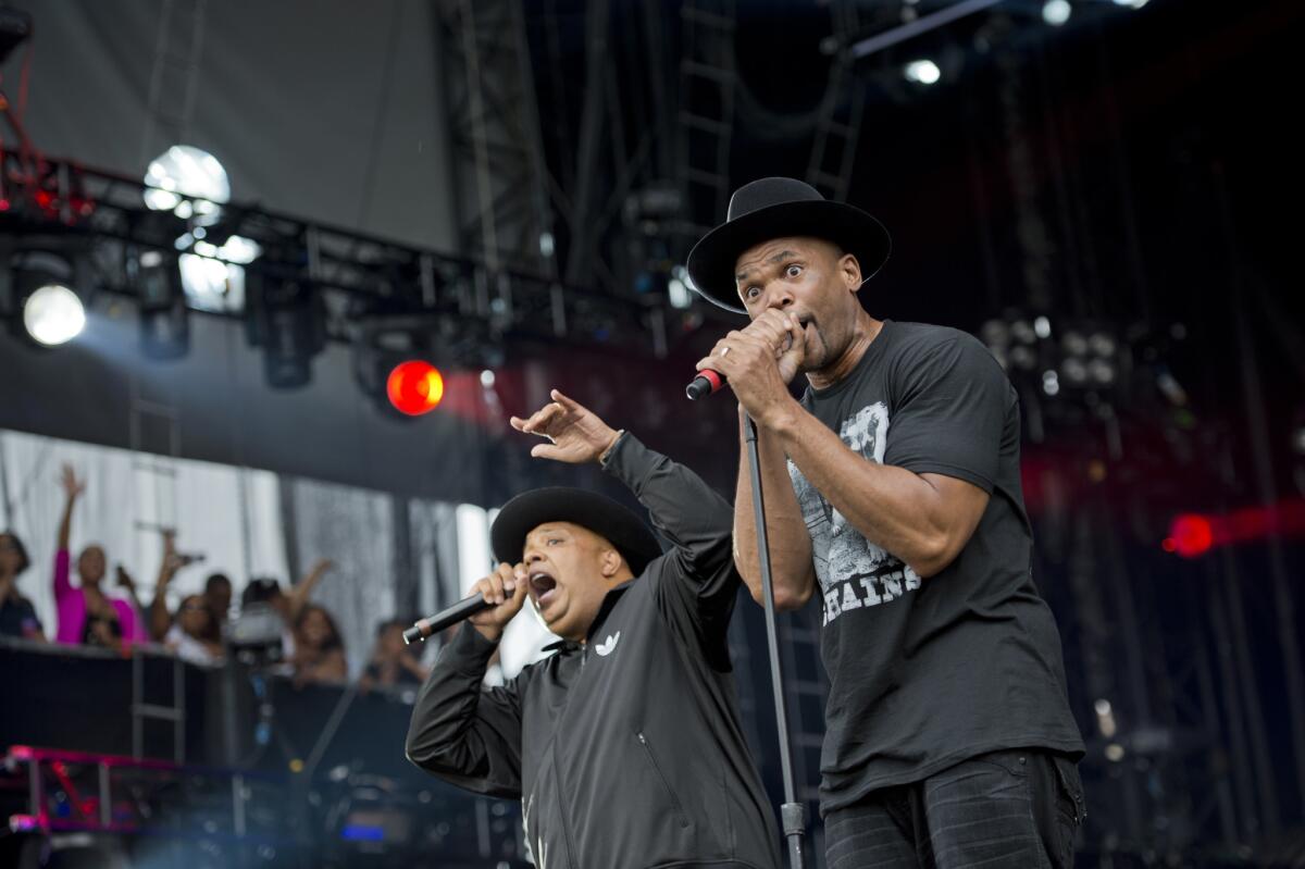 Joseph "Run" Simmons, left, and Darryl "DMC" McDaniels perform in 2012. Run-DMC filed a $50-million lawsuit Thursday accusing Wal-Mart, Amazon, Jet and other retailers of selling products that traded on the group's name without permission.