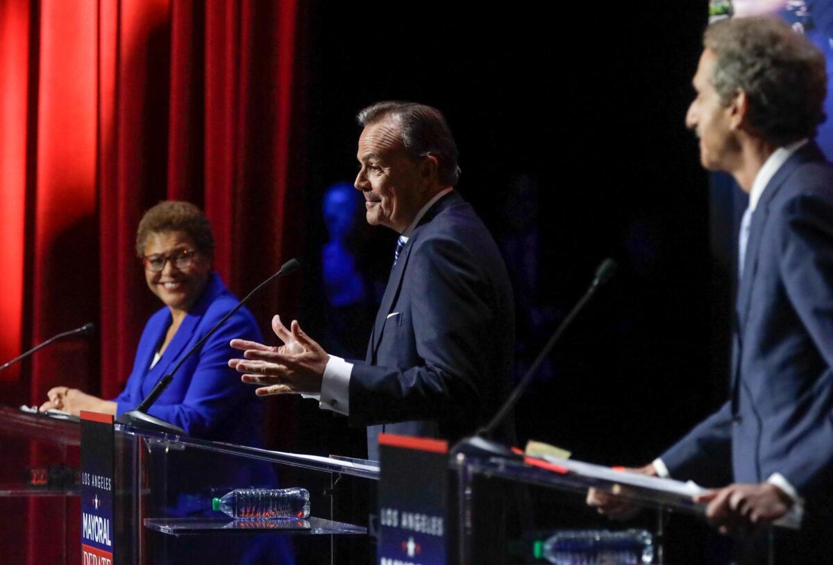 U.S. Rep. Karen Bass, left, businessman Rick Caruso and Los Angeles City Atty. Mike Feuer during the mayoral debate.