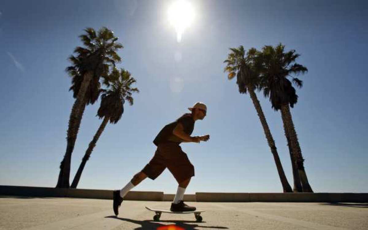 Myers, 27, of Ventura works his skateboard as he enjoys the beautiful weather last week at Seaside Park in downtown Ventura.