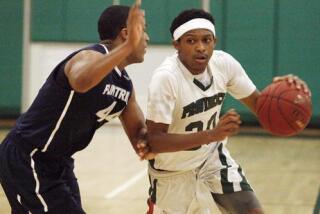 ARCHIVE PHOTO: Marcus LoVett, right, averaged 31.7 points per game last season, best in the nation among freshmen according to MaxPreps.com.