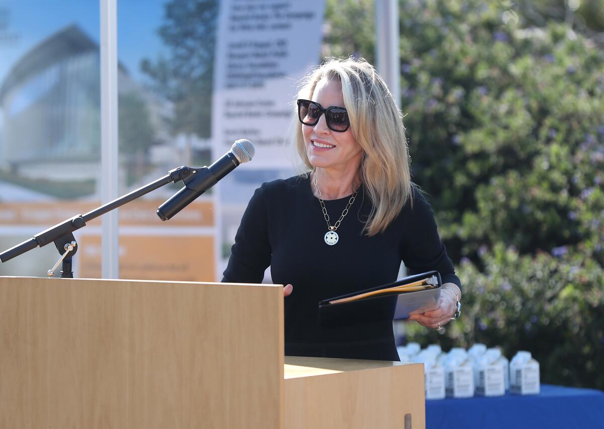 Jill Johnson-Tucker remarks on the project during groundbreaking ceremony.