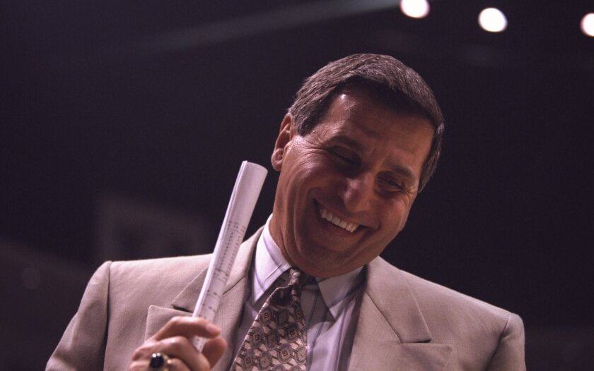 9 Dec 1995: Head coach Jim Harrick of the UCLA Bruins lets out a big smile after his team defeats the Maryland Terrapins at the Wooden Classic at Arrowhead Pond in Anaheim, California. UCLA defeated Maryland 73-63.