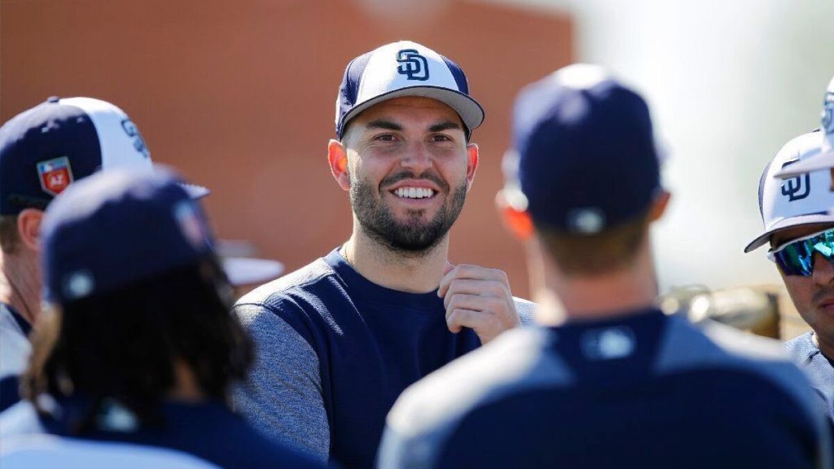 Padres first baseman Eric Hosmer listens during a spring training practice in Peoria on Feb. 20, 2018.