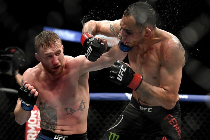 JACKSONVILLE, FLORIDA - MAY 09: Justin Gaethje (L) of the United States punches Tony Ferguson (R) of the United States in their Interim lightweight title fight during UFC 249 at VyStar Veterans Memorial Arena on May 09, 2020 in Jacksonville, Florida. (Photo by Douglas P. DeFelice/Getty Images)