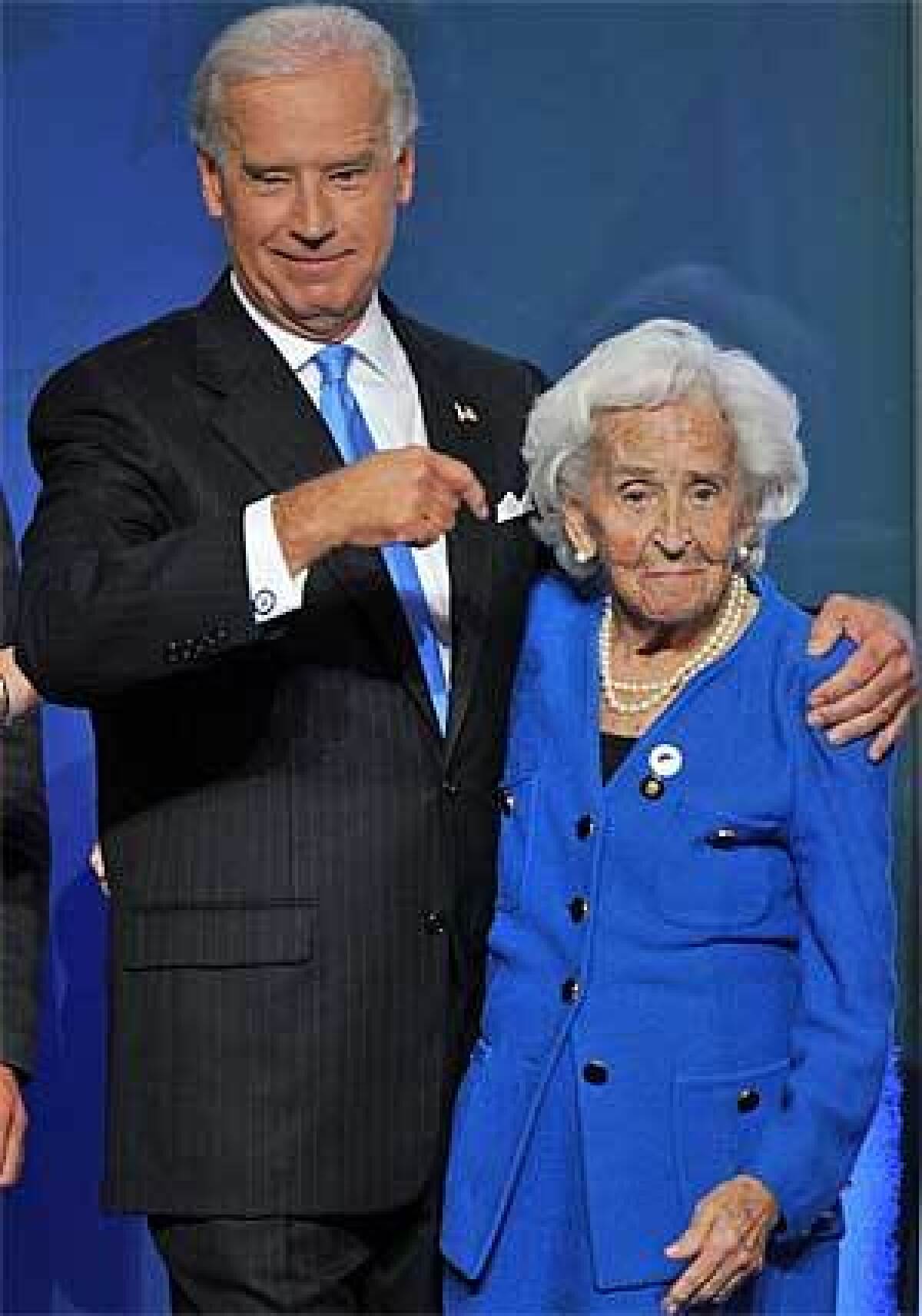 Joe Biden pointing to his mother, Jean Finnegan Biden, on stage during the 2008 Democratic National Convention in Denver.
