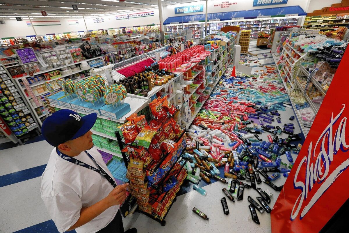 Cesar Zamora, night manager at a 99 Cent Only store in Brea, looks over aisles of fallen goods after a 5.1 magnitude quake in March. "Every earthquake makes another earthquake more likely," says USGS seismologist Lucy Jones.