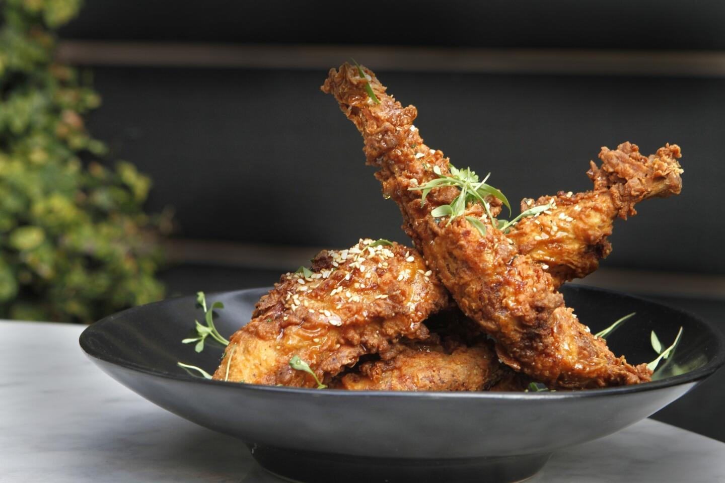 Jonathan Gold says the chicken fried rabbit, which is brushed with honey, is even better than the fried chicken served at the Ladies' Gunboat Society.