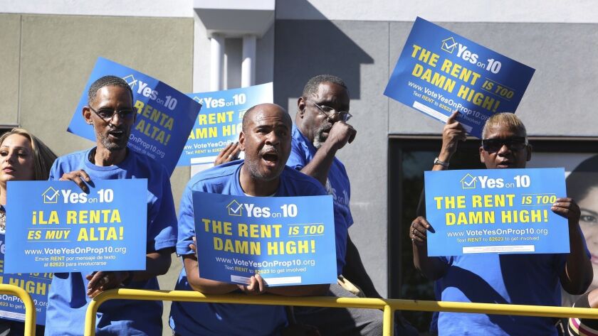 Supporters of Proposition 10, in favor of rent control, demonstrate at an event last month in Sacramento. The measure would have made it easier for cities to expand rent control.