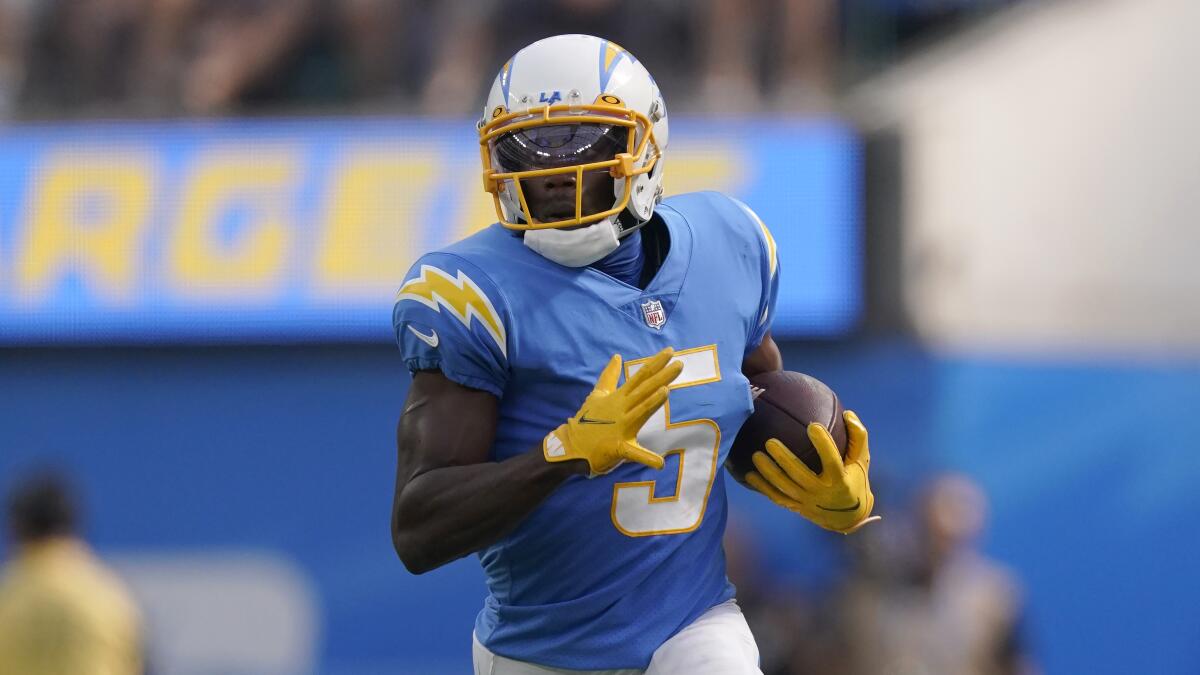 Chargers wide receiver Joshua Palmer runs with the ball during a loss to the Jacksonville Jaguars.