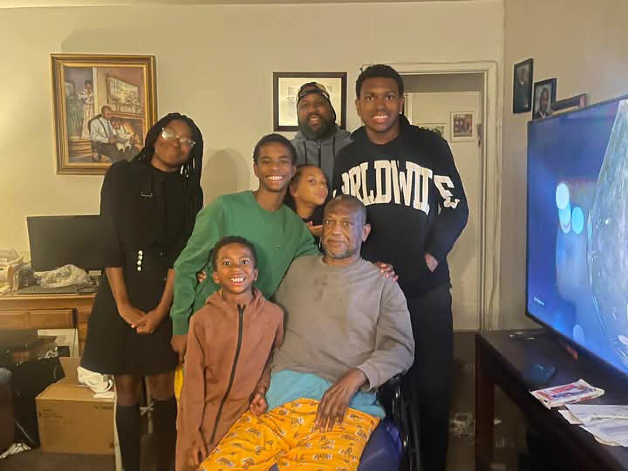 Anthony Mitchell Sr. surrounded by generations of his family.