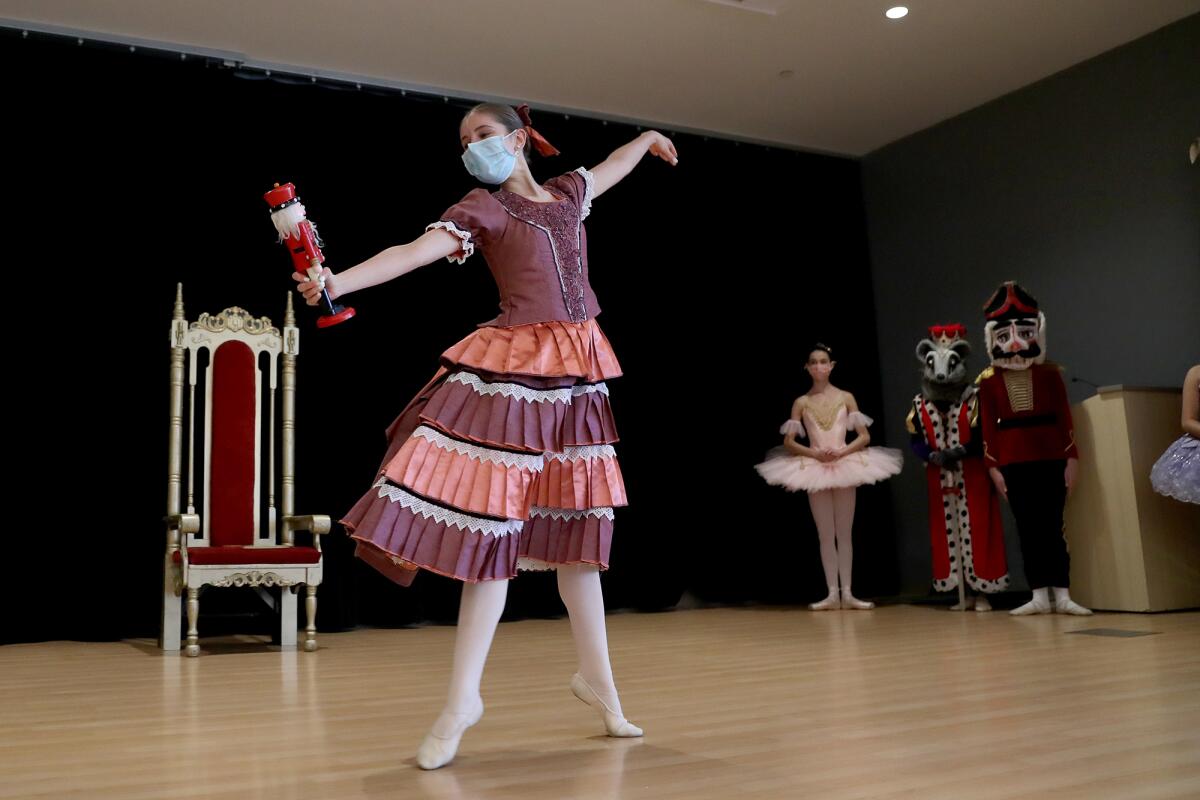 The character known as Clara performs during  Sugar Plum Fairy Tea Party.