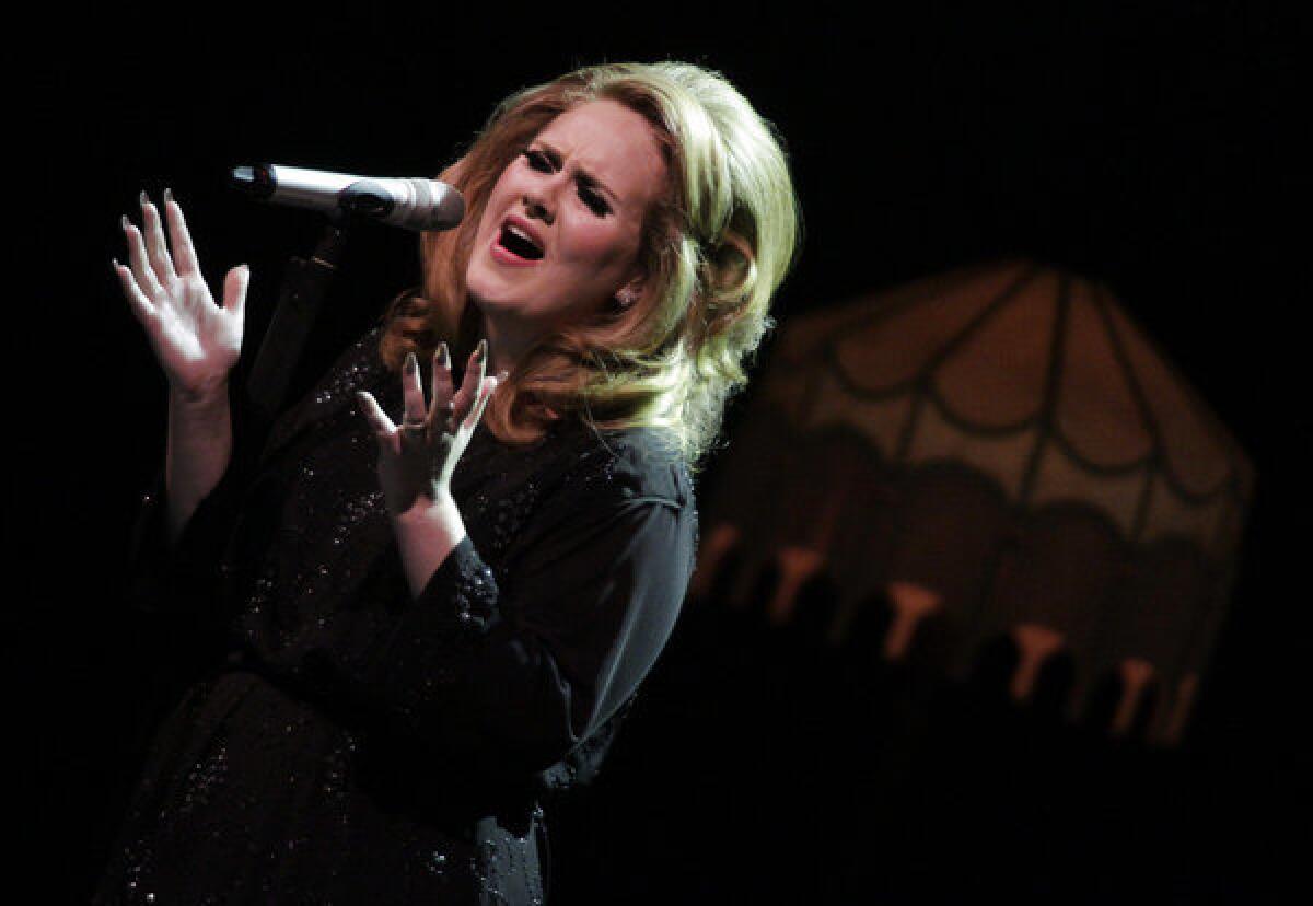 Adele's "21" is one of just eight albums to sell 10 million copies in their first two years of release. Above, Adele performs at L.A.'s Greek Theatre in 2011.