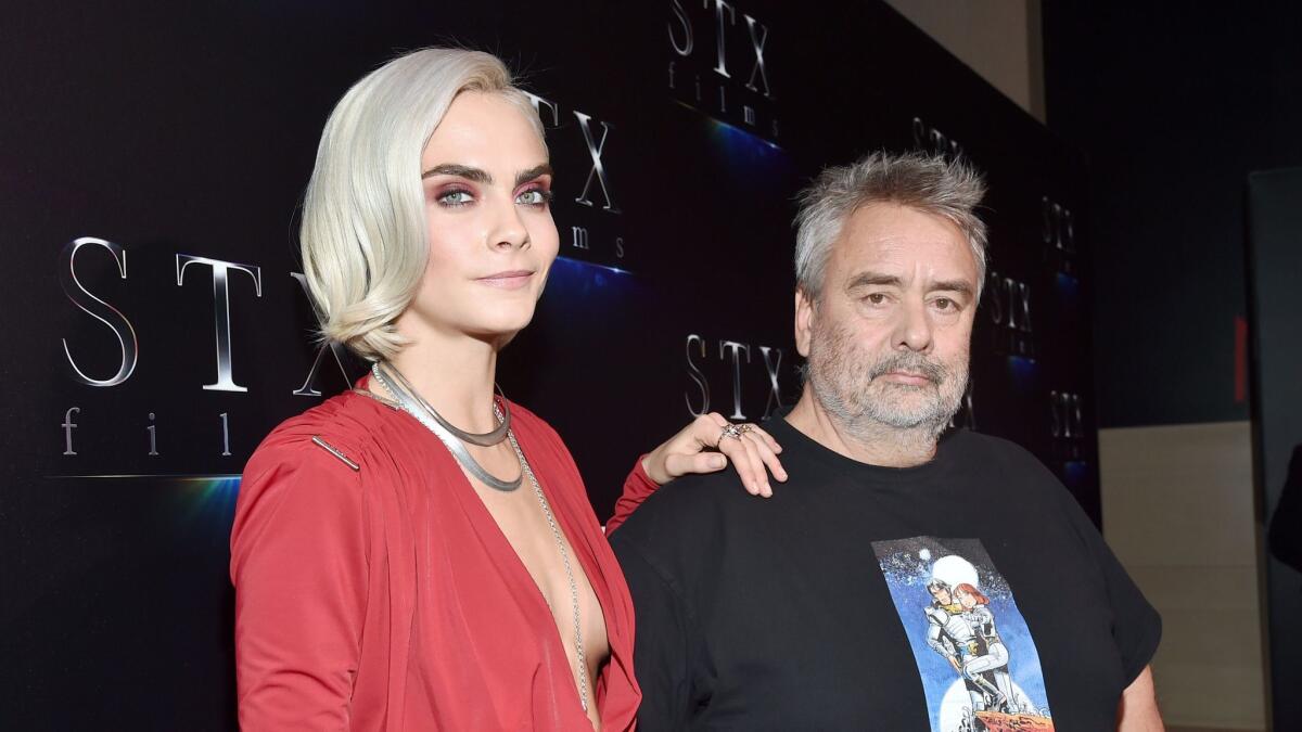 Cara Delevingne and director Luc Besson.