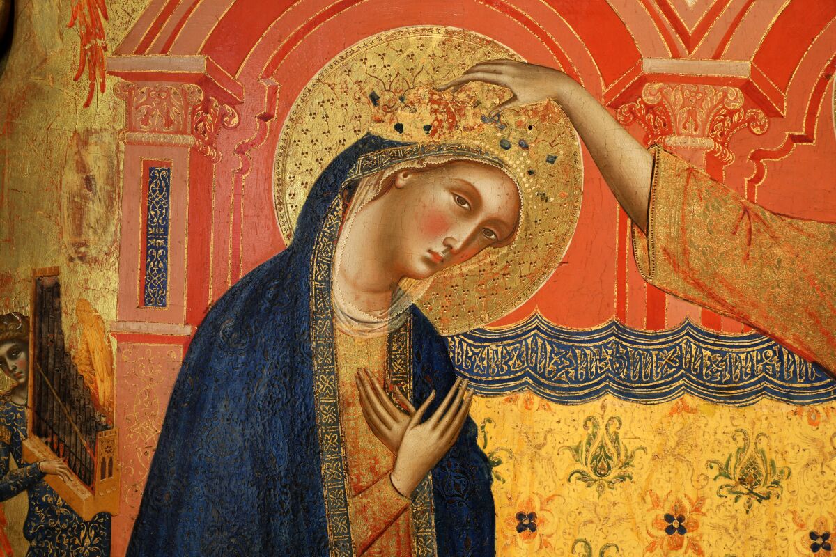 A 14th century painting of a hand placing a crown on the Virgin's slightly bowed head.