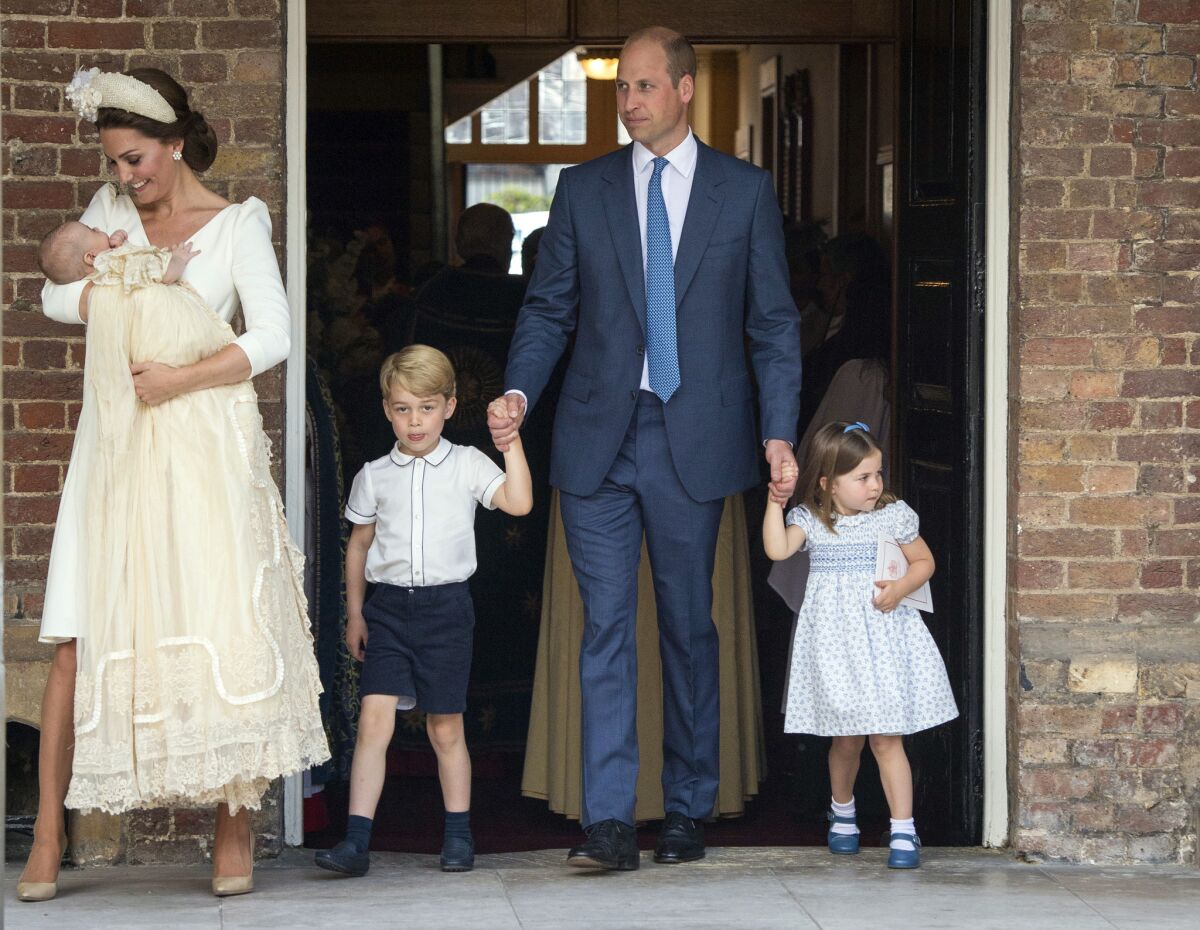 Britain's Prince William and Catherine, Duchess of Cambridge with their children Prince George, Princess Charlotte Prince Louis as they arrive for Prince Louis' christening service at the Chapel Royal, St James's Palace, London, Monday, July 9, 2018.