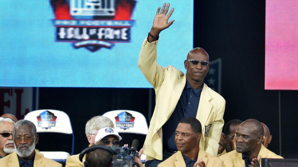 Hall of Fame enshrinee Eric Dickerson is introduced during the Pro Football Hall of Fame enshrinement ceremony, in Canton, Ohio on Aug 2, 2014.