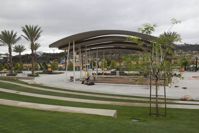 The stage and turf amphitheater at the southern edge of the park is the central feature of the facility.