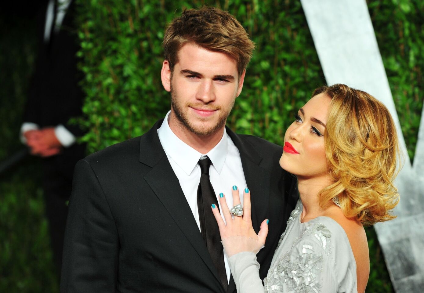 After Miley Cyrus unfollowed Liam Hemsworth on Twitter in September, it was only a matter of time: The two officially called off their engagement. The pair met while making the movie "The Last Song" in 2010 and got engaged in May 2012, but their relationship was reportedly on the rocks for most of 2013 amid rumors of infidelity and Cyrus being spotted without her engagement ring. The "Wrecking Ball" singer was enjoying quite a bit of time in the spotlight after her controversial performance at the MTV VMAs in August; however, soon after the split was announced rumors surfaced that the "The Hunger Games" star was already seeing another woman and Cyrus was getting cozy with one of her record producers. "I'm just letting that chapter kind of close and just looking forward to that new one," Cyrus told Ellen DeGeneres in October, following the split.. "I want to be really clear and determined with everything I'm doing in my life right now, and I have been .... I keep saying I'm the happiest I've ever been, and that's not even a dig." MORE: Miley Cyrus, Liam Hemsworth call it quits, end engagement