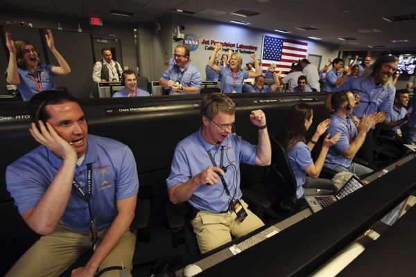 NASA scientists at the Jet Propulsion Laboratory in La Canada-Flintridge celebrate the landing of the rover Curiosity on Mars.