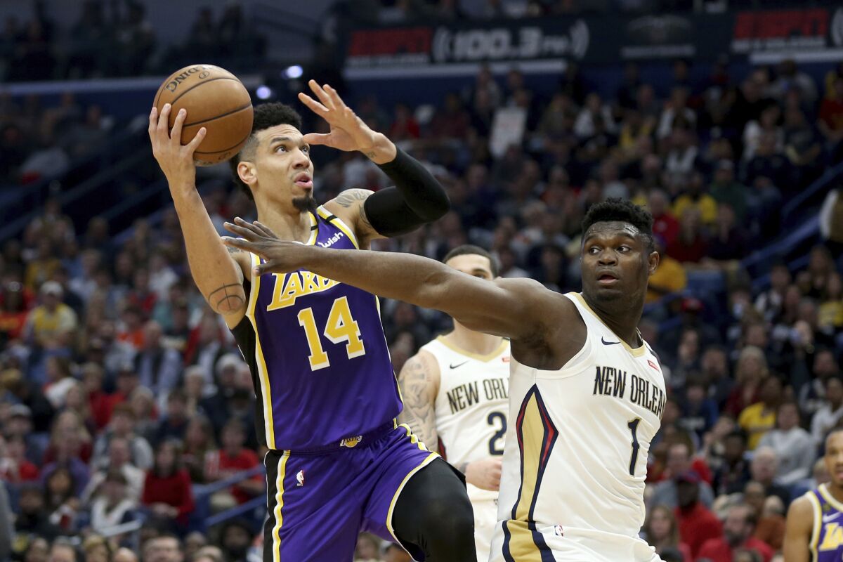 The Lakers' Danny Green drives against the Pelicans' Zion Williamson on March 1, 2020.